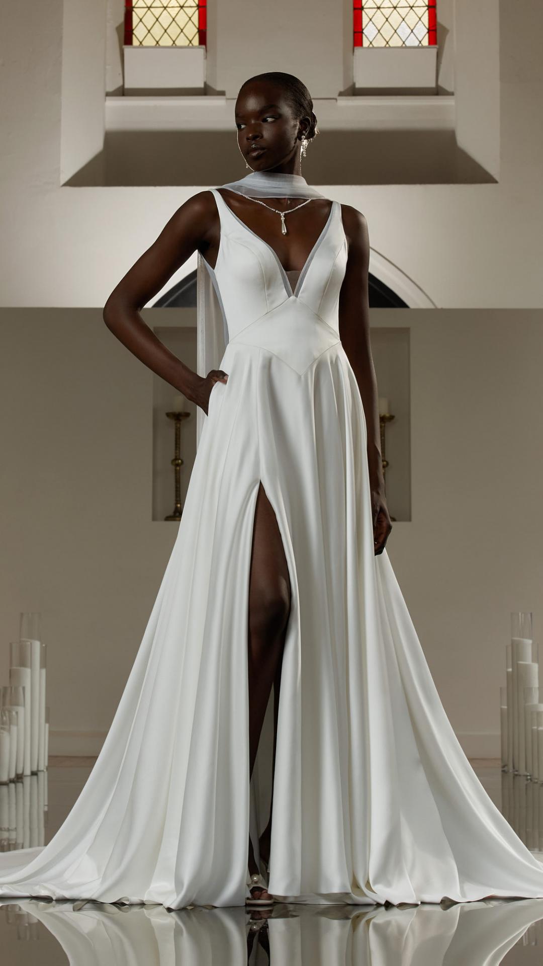 modern A-line satin wedding dress with plunge neckline, shoulder straps, leg split and detachable scarf accessory with pearl drop detail Amy by Evie Young Bridal